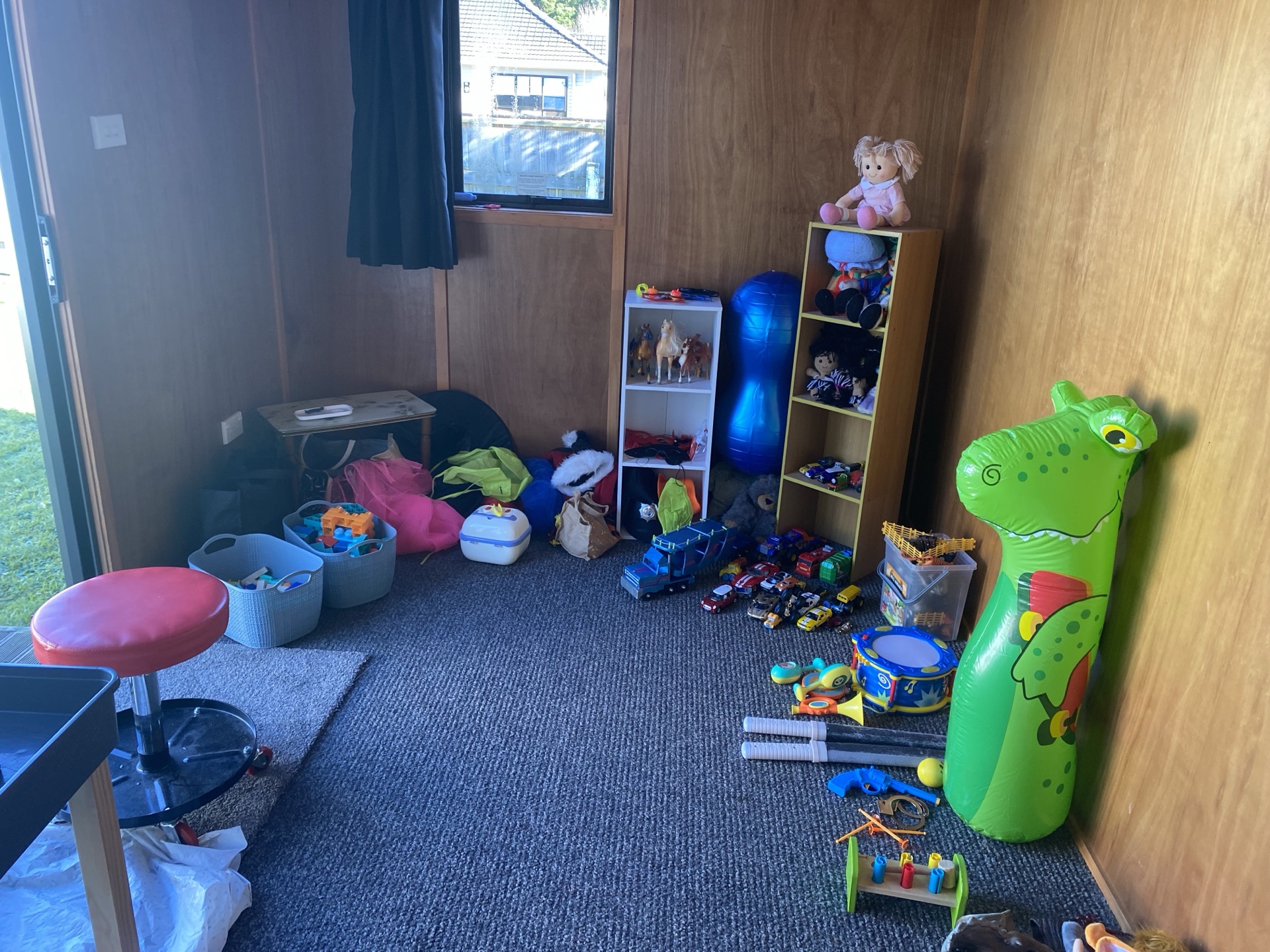 Tamariki Play Through playroom with toys, dolls and creative materials ready for child-led play